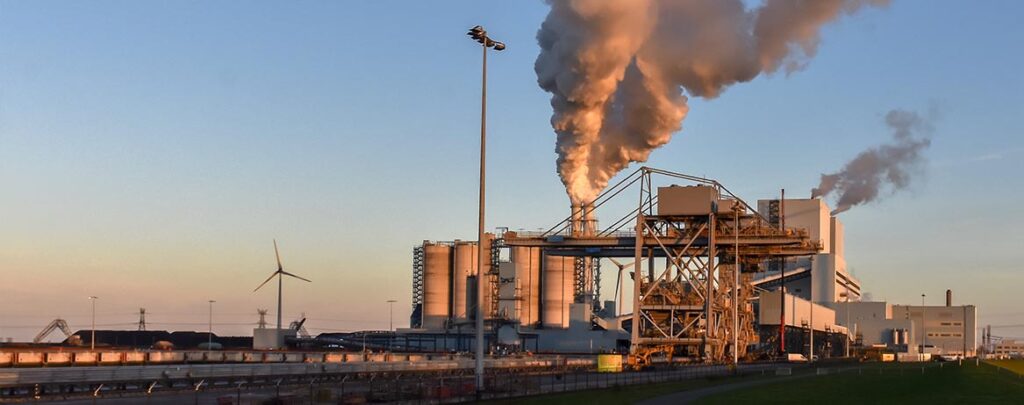 Industrial complex with smoke stacks